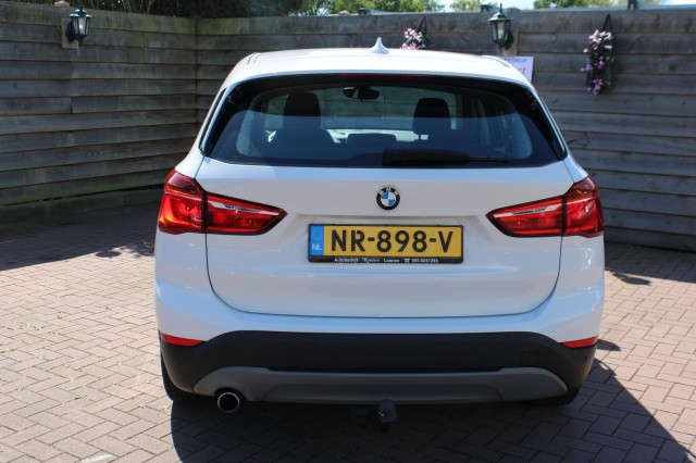 BMW X1 sDrive18i 136pk Essential ECC/Cruise/Navi/PDC/Stoelverw/Trekhaak, Autobedrijf Roetert, Loenen
