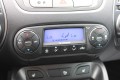 HYUNDAI IX35 1.6I GDI 135pk GO! ECC/cruise/navi/half leer/camera/trekhaak, Autobedrijf Roetert, Loenen