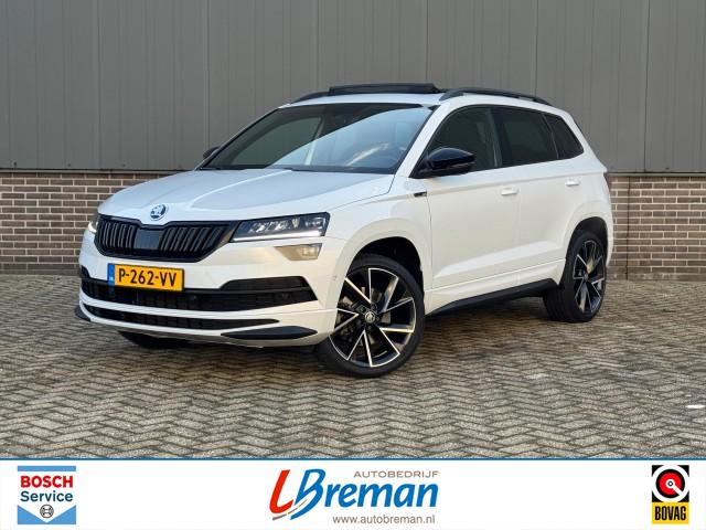 SKODA KAROQ 1.5 TSI ACT SPORTLINE BUSINESS DSG Panodak trekhaak , Autobedrijf Breman, Genemuiden