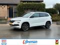 SKODA KAROQ 1.5 TSI ACT SPORTLINE BUSINESS DSG Panodak trekhaak Autobedrijf Breman, Genemuiden