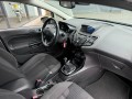 FORD FIESTA 1.0 EcoB. Titanium,Navi,Clima,Cruise,PDC,LMV,Dealer OH, Autobedrijf W. Verstappen, Uden