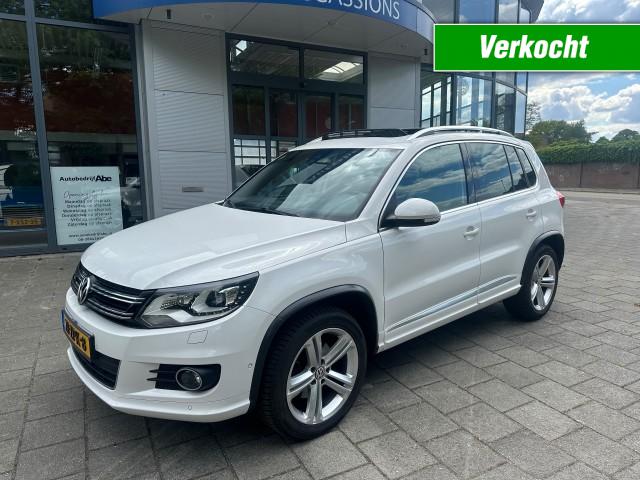 VOLKSWAGEN TIGUAN 1.4 TSI SP&ST R-LINE-LMV-ECC-PDC-NAVI-XENON-SCHUIFDAK-LEER-ORIG , Autobedrijf Abe, Steenwijk