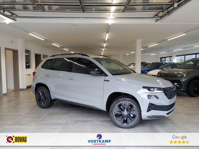 Skoda Karoq - 1.5 TSI DSG SPORTLINE TREKHAAK/CAMERA/CARPLAY/ACC/STOELVERW/E-KLEP