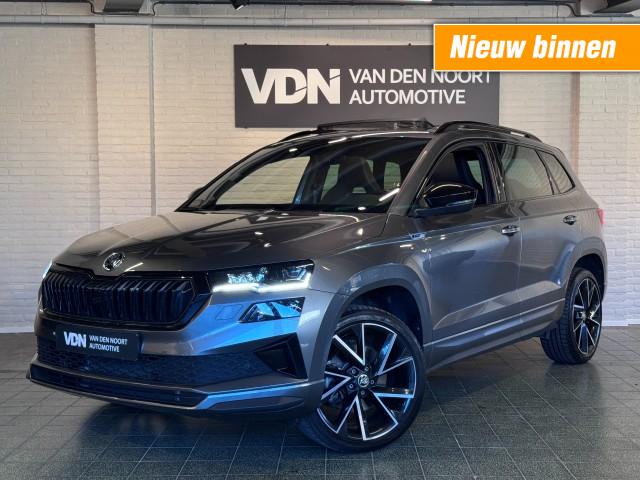Skoda Karoq - 1.5 TSI Sportline Business Pano DCC Trekhaak ACC 19''