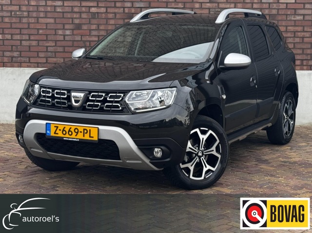 DACIA DUSTER - 1.3 TCe Prestige / 130 PK / Trekhaak / Navigatie + Camera Rondom